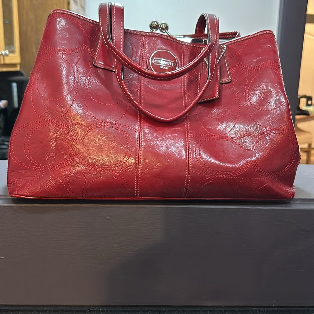 Coach Red Tote Bag with Leather Material and Structured Design